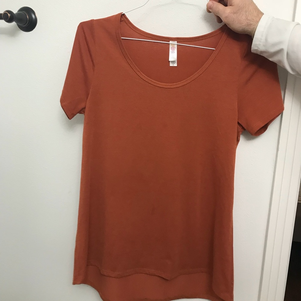 Burnt orange lularoe top